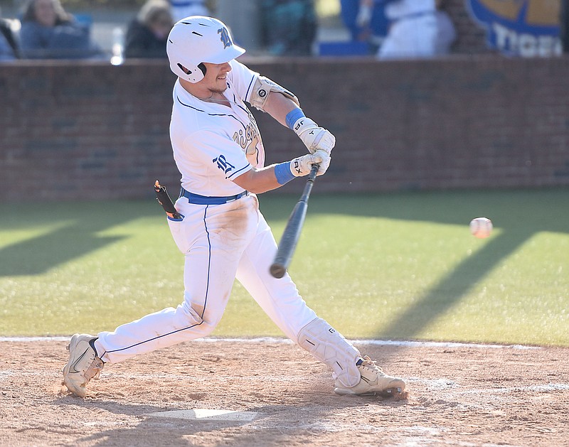 Staff photo by Matt Hamilton/ Ringgold's Conner Christopher connects for a base hit to score a run as the Tigers routed Region 6-AAA rival Ridgeland 12-1 Friday night at Bill Womack Field in Ringgold.