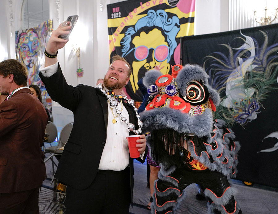 Photo by Mark Gilliland / Zach Baker takes a selfie with a dragon.