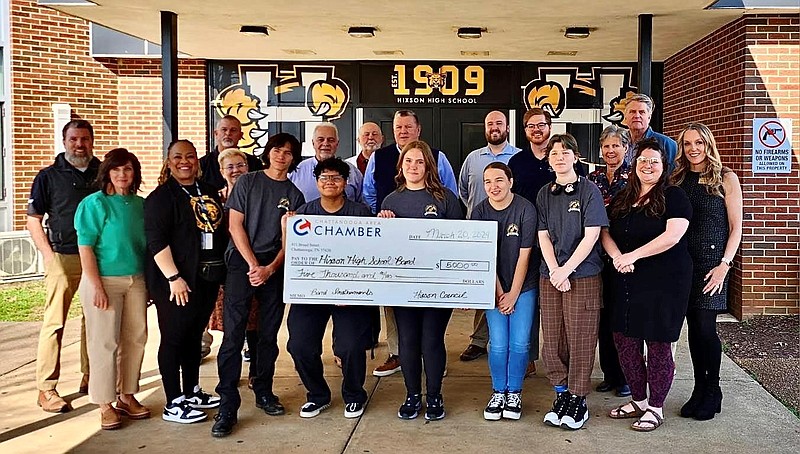 Contributed photo / Members of the Hixson High School band were thrilled with a recent $5,000 donation from the Hixson Council of the Chattanooga Chamber of Commerce for new instruments. School staff, teachers and band students were on hand to accept the donation from the council.