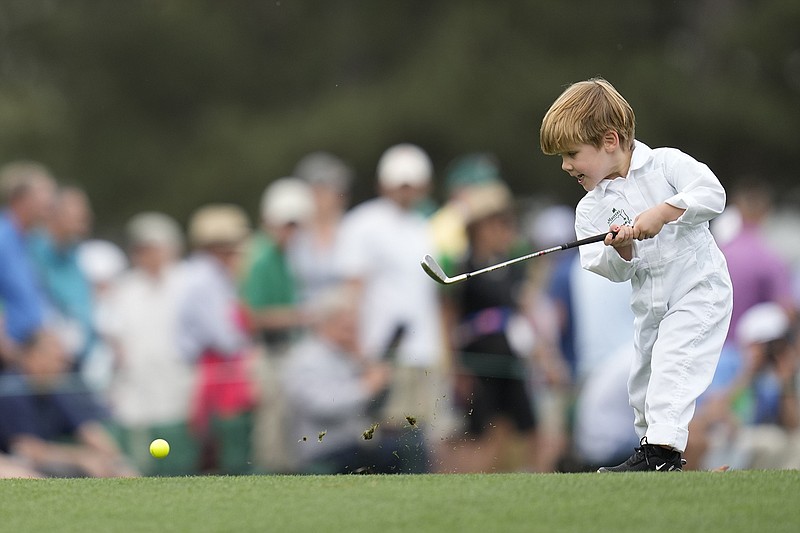 AP photo by Ashley Landis / PGA Tour player Peter Malnati's son Hatcher hits a tee shot on the first hole during the Par 3 Contest on Wednesday at Georgia's Augusta National Golf Club. The nine-hole event is a tradition that dates to 1960 at the Masters and is held the day before the year's first major championship tournament tees off.