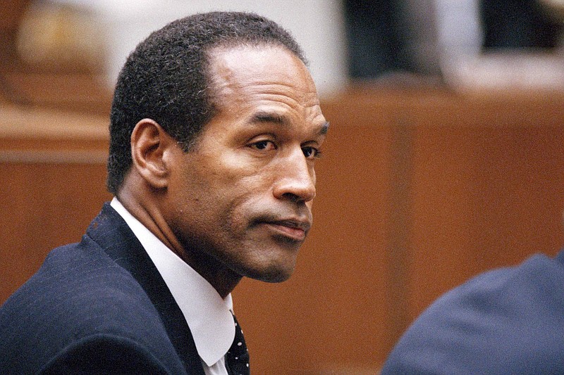 File photo/Lois Bernstein, Pool/The Associated Press / O.J. Simpson sits at his arraignment in Superior Court in Los Angeles on July 22, 1994, where he pleaded "absolutely, 100 percent not guilty" on murder charges. Simpson, the decorated football superstar and Hollywood actor who was acquitted of charges he killed his former wife and her friend but later found liable in a separate civil trial, died Wednesday, April 11, 2024, of prostate cancer at age 76.