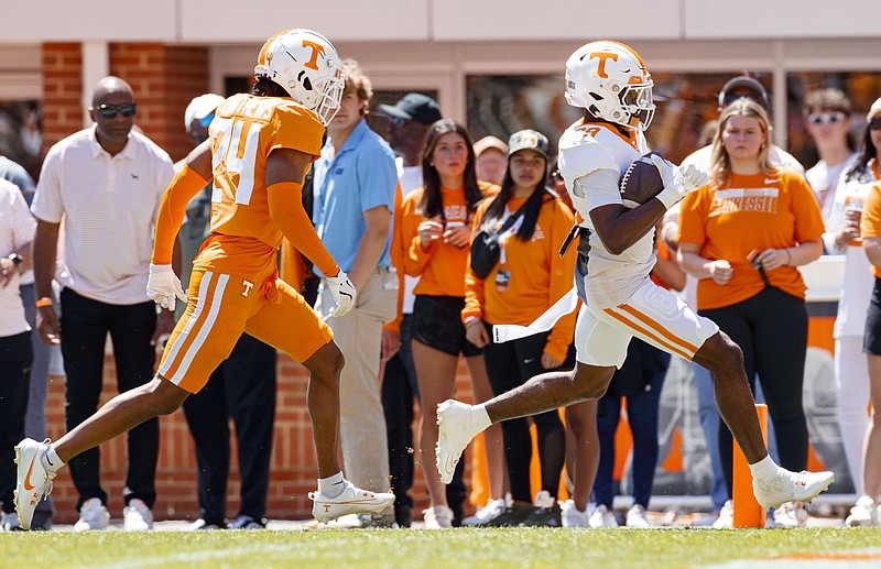 Tennessee Athletics photo by Kate Luffman / Tennessee freshman receiver Mike Matthews scores from 63 yards out during Saturday afternoon's Orange & White Game inside Neyland Stadium.