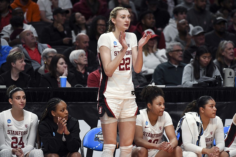AP photo by Steve Dykes / Stanford forward Cameron Brink cheers from the bench after fouling out during an NCAA tournament Sweet 16 college game against North Carolina State on March 29 in Portland, Ore.