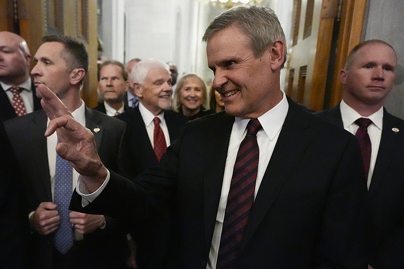 (File Photo/AP) / Gov. Bill Lee arrives to the House chamber to deliver his State of the State address in February. He has signed two bills into law that seek to smooth the fostering or adoption process.