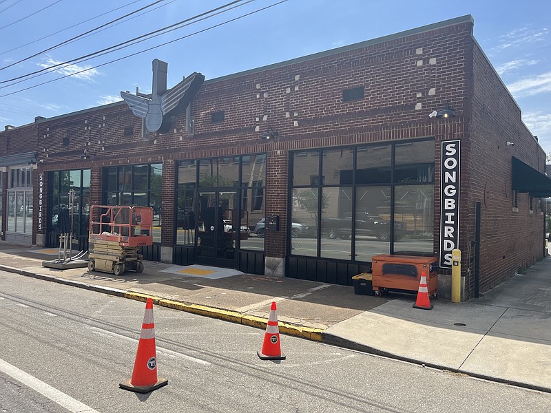Staff Photo by Dave Flessner / A new Songbirds guitar sign has gone up at 206 Main St. where Songbirds will reopen this weekend. Songbirds previously was located in the Chattanooga Choo Choo along Station Street.