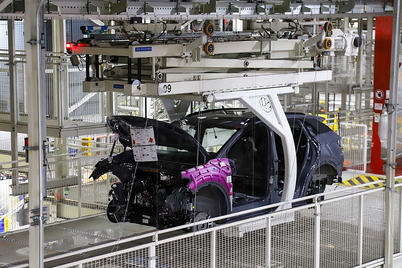 Staff file photo by Olivia Ross / A new VW makes it way through the assembly line at the Volkswagen Chattanooga plant on May 16, 2023. VW employees will vote this week on whether to unionize.