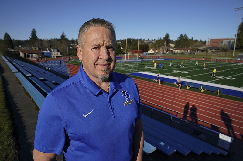 Joe Kennedy, a former assistant football coach at Bremerton High School in Bremerton, Wash., poses for a photo in 2022 at the school's football field. He is set to speak in Ringgold on Thursday. (AP Photo/Ted S. Warren)
