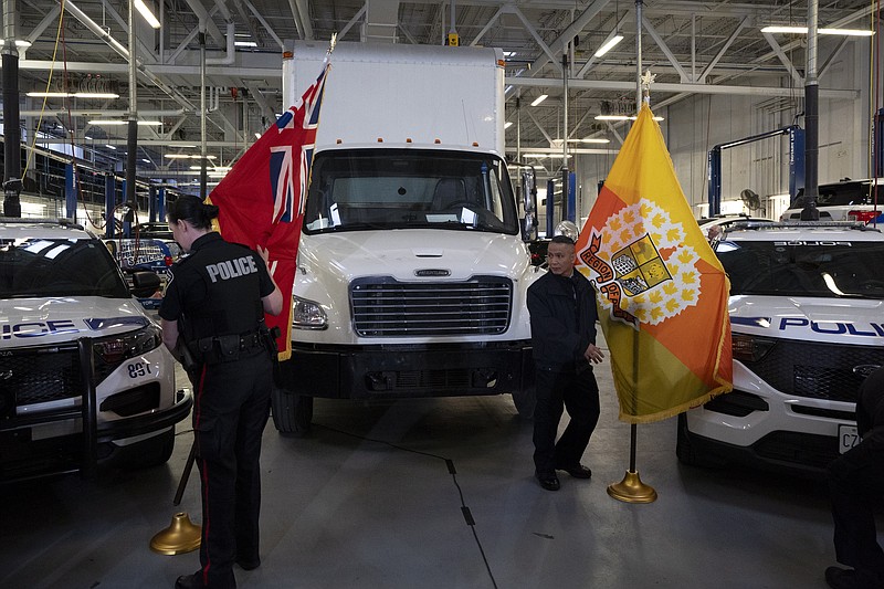 A truck used to transport stolen gold is displayed at a press conference regarding Project 24K a joint investigation into the theft of gold from Pearson International Airport, in Brampton, Ontario, on Wednesday, April 17, 2024. (Arlyn McAdorey/The Canadian Press via AP)