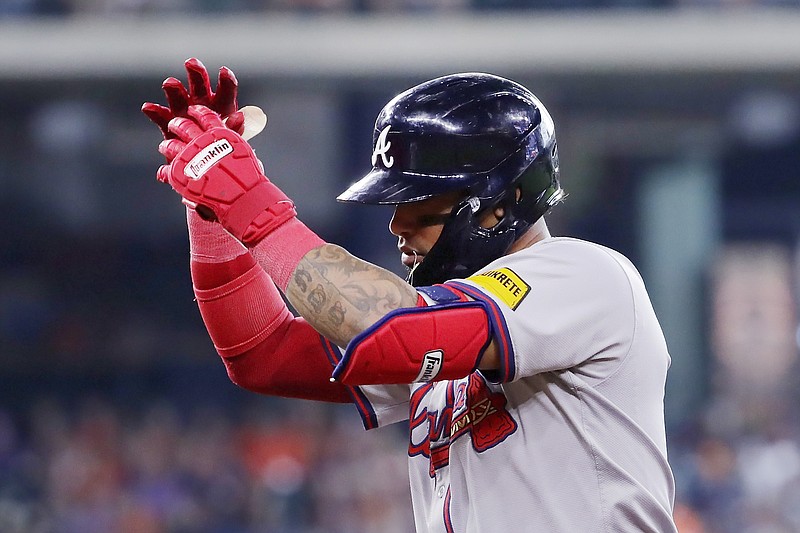 AP photo by Michael Wyke / Atlanta Braves shortstop Orlando Arcia celebrates after hitting a go-ahead RBI single in the top of the 10th inning of Wednesday's game against the Houston Astros. Atlanta held on to win 5-4.