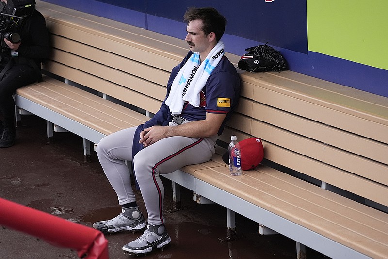 AP photo by Gerald Herbert / Atlanta Braves pitcher Spencer Strider rests in the dugout during spring training on Feb. 19 in North Port, Fla.