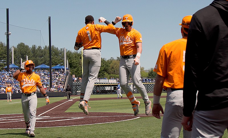Tennessee Athletics photo / Tennessee's Christian Moore (1) and Blake Burke celebrate after opening Saturday afternoon's 9-4 win at Kentucky with consecutive home runs.
