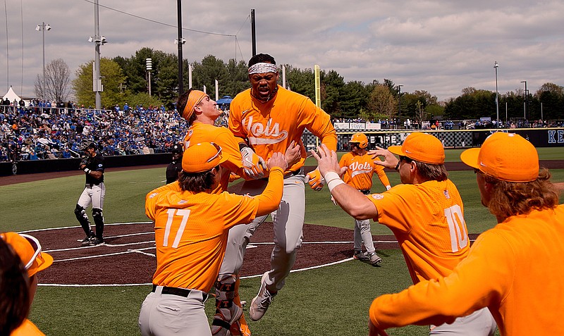 Tennessee Athletics photo / Kavares Tears is mobbed by teammates afer his two-run homer down the right-field line in the seventh inning Sunday afternoon that put Tennessee ahead to stay at 10-8 during an eventual 13-11 win at Kentucky.