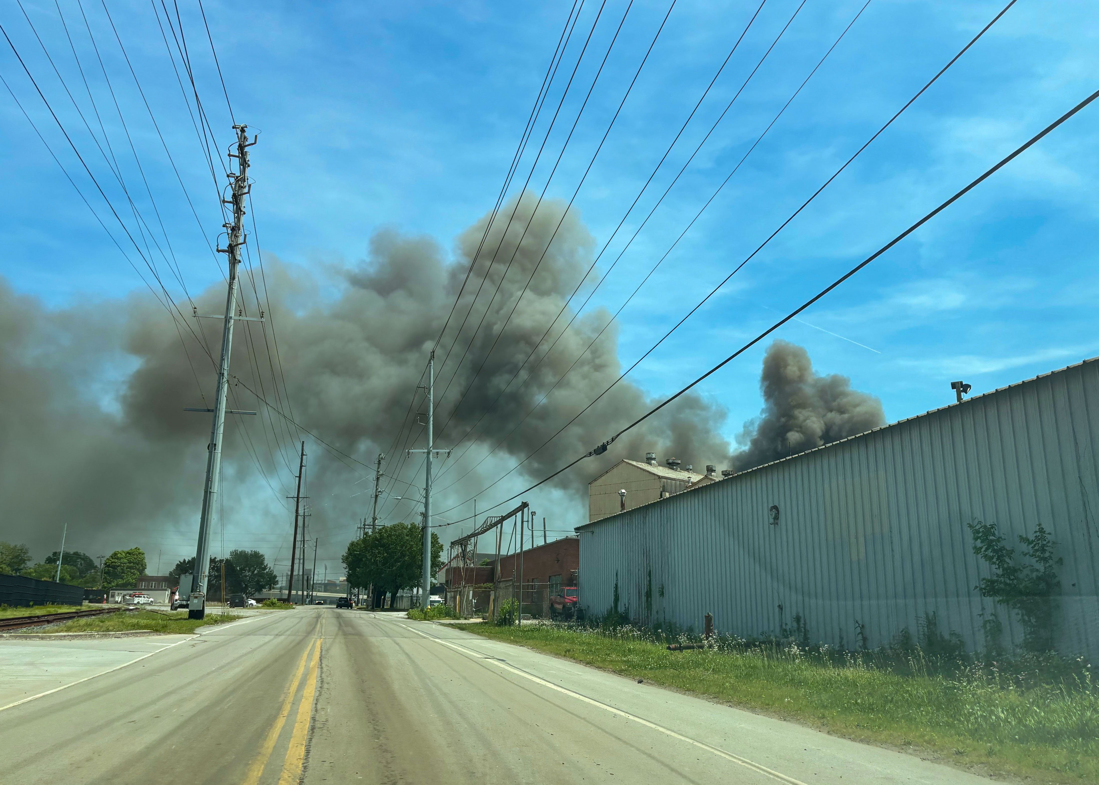 Staff photo by Olivia Ross / Clouds of smoke from a fire near 980 West 19th Street are seen on Tuesday.