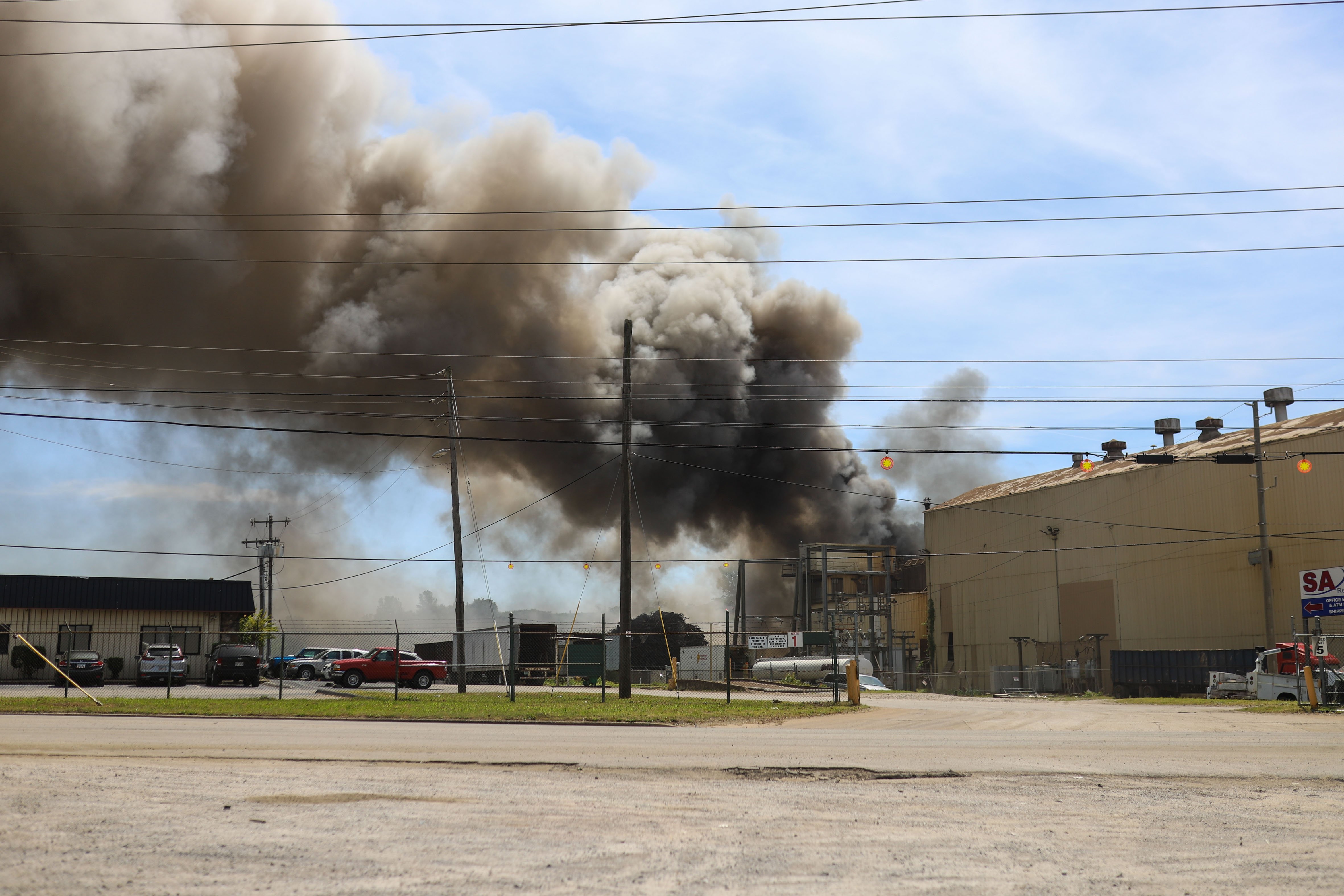 Staff photo by Olivia Ross / Clouds of smoke from a fire near 980 West 19th Street are seen on Tuesday.