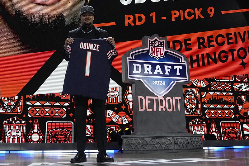 AP photo by Jeff Roberson / Former University of Washington receiver Rome Odunze poses after being selected by the Chicago Bears with the ninth overall pick during the first round of the NFL draft Thursday night in Detroit.