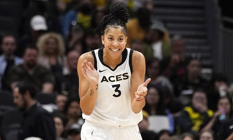 AP photo by Lindsey Wasson / Las Vegas Aces forward Candace Parker celebrates during a road game against the Seattle Storm in May 2023.