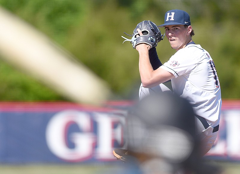 Staff photo by Matt Hamilton / Heritage senior Max Owens pitches during Wednesday's first game against Seckinger in a GHSA Class AAAA playoff series Wednesday in Ringgold, Ga.