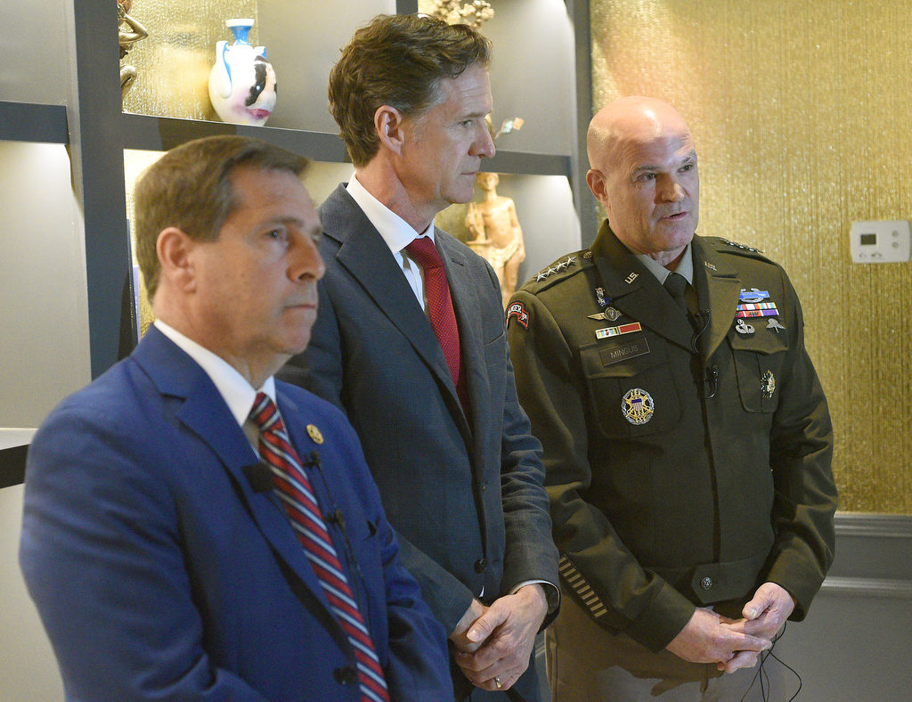 Staff photo by Matt Hamilton / Vice Chief of Staff of the Army General James J. Mingus, right, speaks during a press availability at the Read House with Rep. Chuck Fleischmann and Mayor Tim Kelly on Friday.