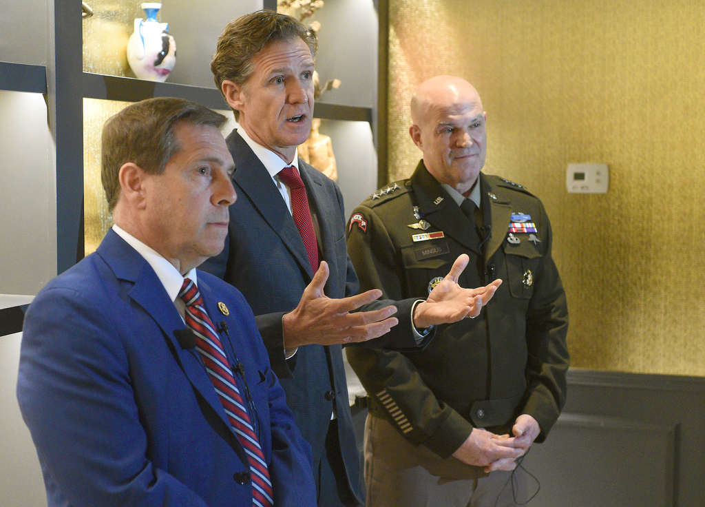 Staff photo by Matt Hamilton / Rep. Chuck Fleischmann, Mayor Tim Kelly and General James J. Mingus speak during a press availability at the Read House on Friday.