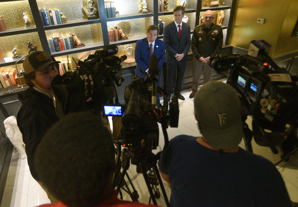 Staff photo by Matt Hamilton/ Rep. Chuck Fleischmann, Mayor Tim Kelly and General James J. Mingus speak during a press availability at the Read House on Friday.