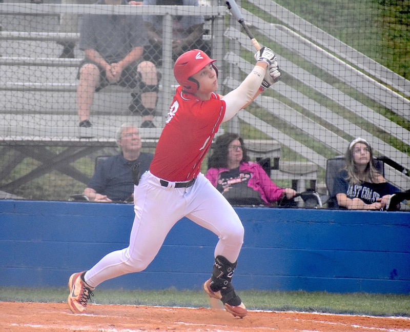 Staff photo by Patrick MacCoon / Signal Mountain's Ben Timblin watches his 400-plus-foot home run during Friday's District 6-3A championship game against Soddy Daisy at Red Bank High School.