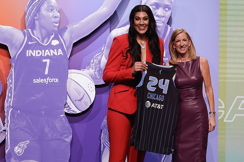 AP photo by Adam Hunger / Kamilla Cardoso, left, poses for a photo with WNBA commissioner Cathy Engelbert after being drafted third overall by the Chicago Sky on April 15 in New York.