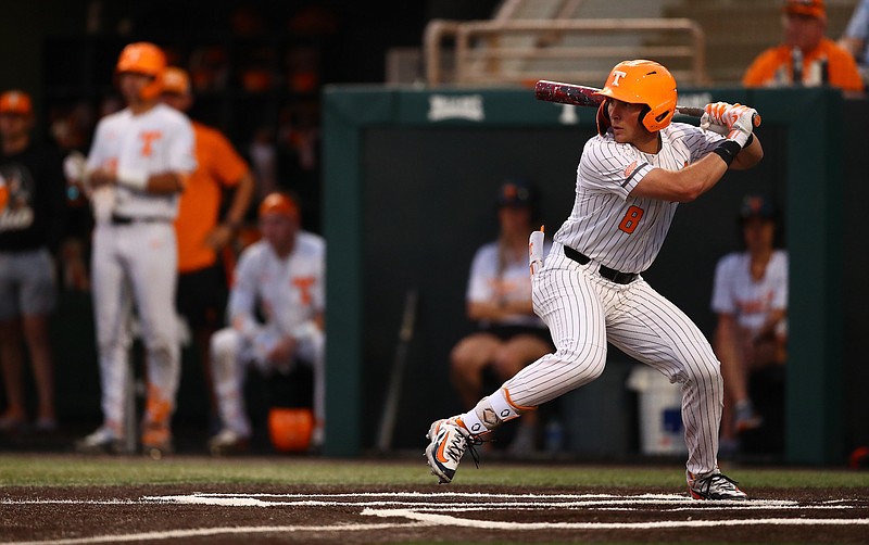 Tennessee Athletics photo / Tennessee's Dylan Dreiling prepares to launch a three-run home run to right field in the seventh inning Tuesday night that propelled the No. 1 Volunteers to a 6-3 win over Queens.