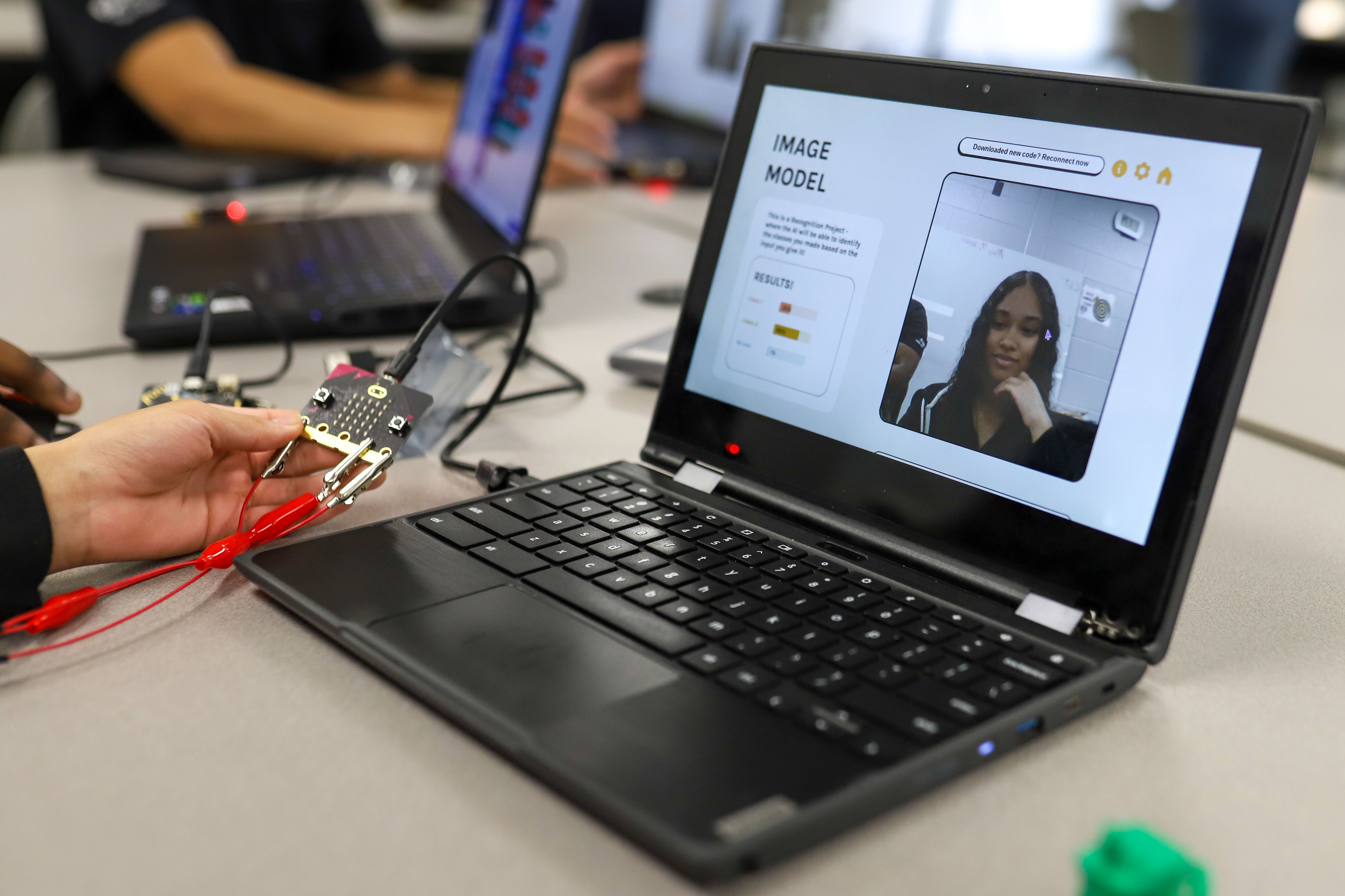 Staff photo by Olivia Ross / Parris Bolden demonstrates her work at Tyner Academy. EPB Future Ready Institute of Technology and Networking students demonstrated their creations during Tyner's World Quantum Day showcase on Tuesday.