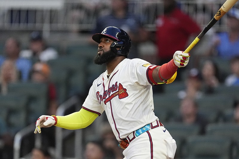 AP photo by John Bazemore / Atlanta Braves designated hitter Marcell Ozuna follows through on a home run in the third inning of a game against the visiting Boston Red Sox on Wednesday night.
