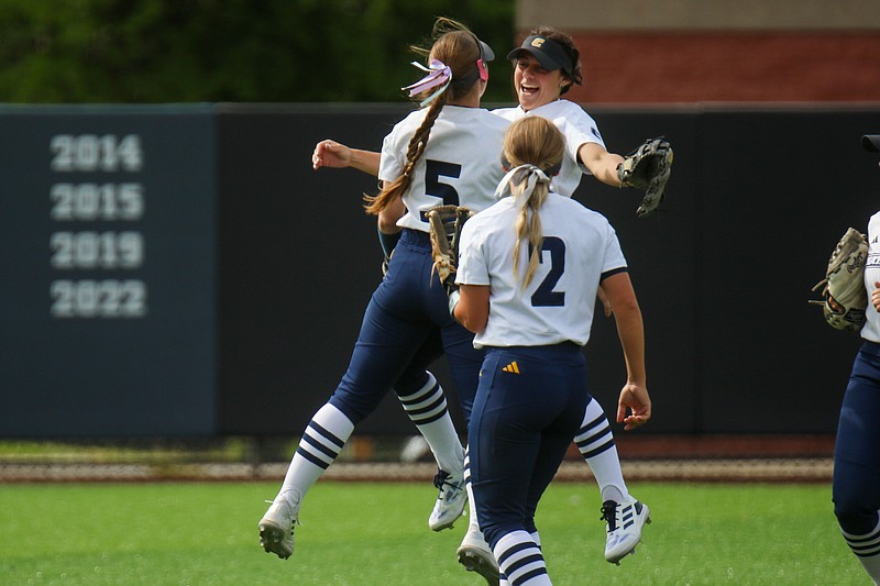 Staff photo by Olivia Ross / UTC's Camryn Cernuto (77), right, celebrates with Olivia Lipari (5) during a recent home game. UTC defeated Mercer 10-1 Thursday to advance in the Southern Conference tournament.