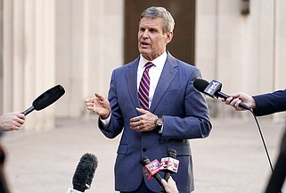 Tennessee Gov. Bill Lee speaks to reporters in Nashville on Jan. 19, 2021. A federal judge ruled this week a lawsuit could move forward challenging a 3-year-old Tennessee law restricting concepts taught in school.  (AP Photo/Mark Humphrey, File)