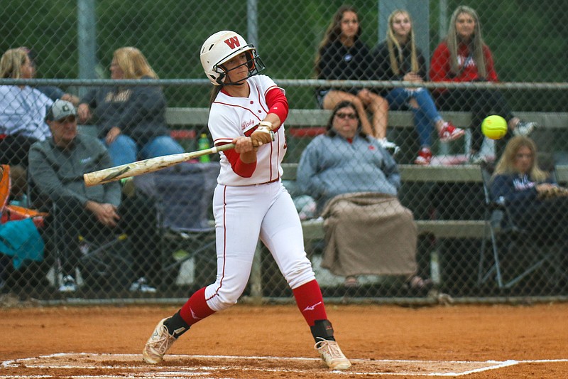 Staff photo by Olivia Ross / Whitwell's Mallory O'Neal (5) gets a hit. Whitwell took on Sale Creek in a 3-1A semifinal game at home on Monday, May 13, 2024.