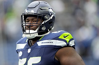 AP photo by Lindsey Wasson / Seattle Seahawks offensive lineman McClendon Curtis warms up before a home game against the Arizona Cardinals on Oct. 22. Curtis was a prep star at Central in Harrison before going on to be a college star at his hometown school of UTC.