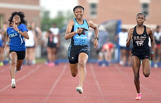 Staff Photo by Robin Rudd / Brainerd's Danielle Dunning, center, wins the 100 meter dash.  TSSAA track was played at the Dean Hayes Stadium at Middle Tennessee State University in Murfreesboro on May 23, 2023.