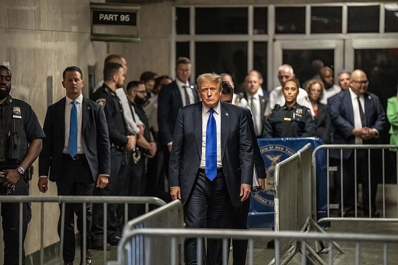 Photo/Mark Peterson/New York Magazine via AP, Pool /Former President Donald Trump walks out of court and toward the media following the verdict in his hush money trial in New York on Thursday, May 30, 2024.