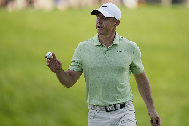 AP photo by Sue Ogrocki / Rory McIlroy gestures after putting on the 17th green during the first round of the PGA Tour's Memorial Tournament on Thursday in Dublin, Ohio.