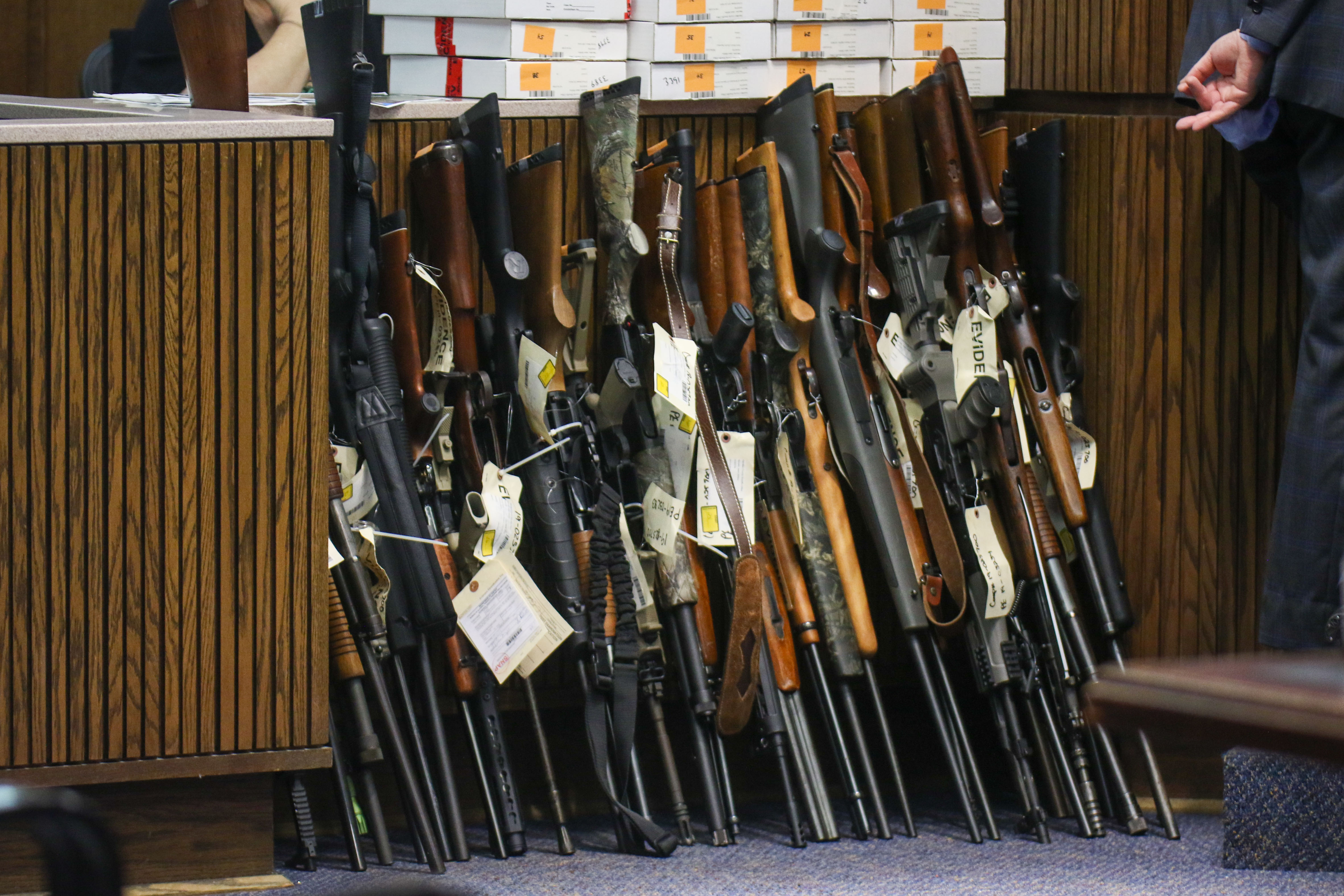 Staff photo by Olivia Ross / Several firearms are seen sitting at the front of the court during Raymond Rzeplinski's trial Wednesday at the Courts Building in Chattanooga.