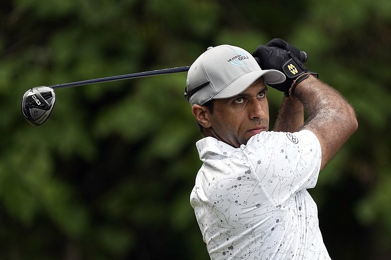 AP photo by Chuck Burton / Aaron Rai watches his tee shot on the second hole at Sedgefield Country Club during the final round of the PGA Tour's Wyndham Championship on Sunday in Greensboro, N.C.