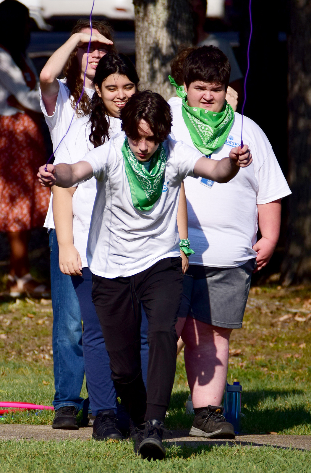 Staff Photo by Robin Rudd / Donny Holland leads the green team in jump rope relay during a color wars team building exercise at the St. Elmo Recreation Center on Aug. 20, 2024. The BlueSky Institute at BlueCross BlueShield Tennessee is a 27-month tech workforce development program that allows students to obtain a degree, learning from university professionals, and get a job with the company upon graduation.