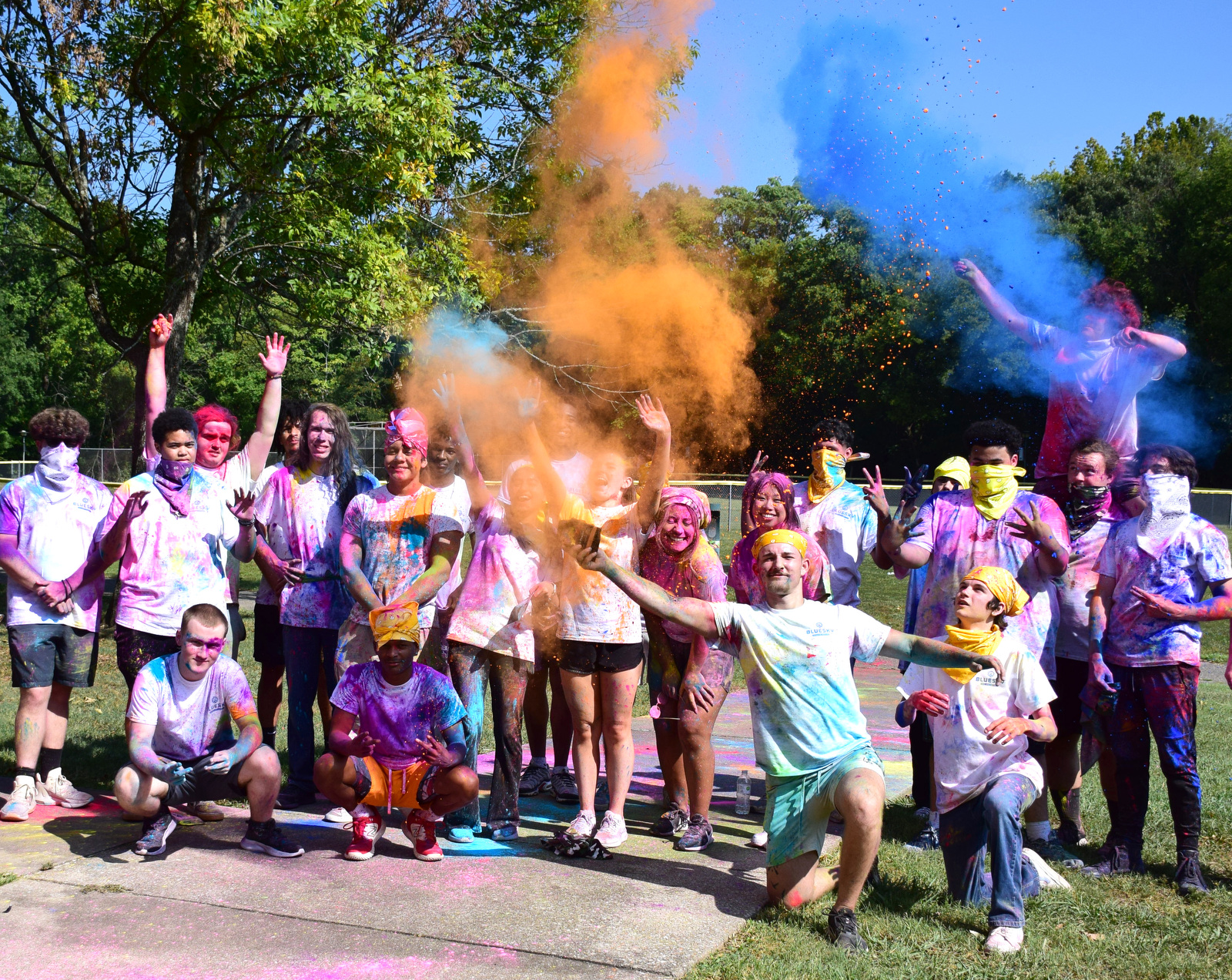 Staff Photo by Robin Rudd / The combatants pose for a group photo at the end of the group building session's color war at the St. Elmo Recreation Center on Aug. 20, 2024. The BlueSky Institute at BlueCross BlueShield Tennessee is a 27-month tech workforce development program that allows students to obtain a degree, learning from university professionals, and get a job with the company upon graduation.