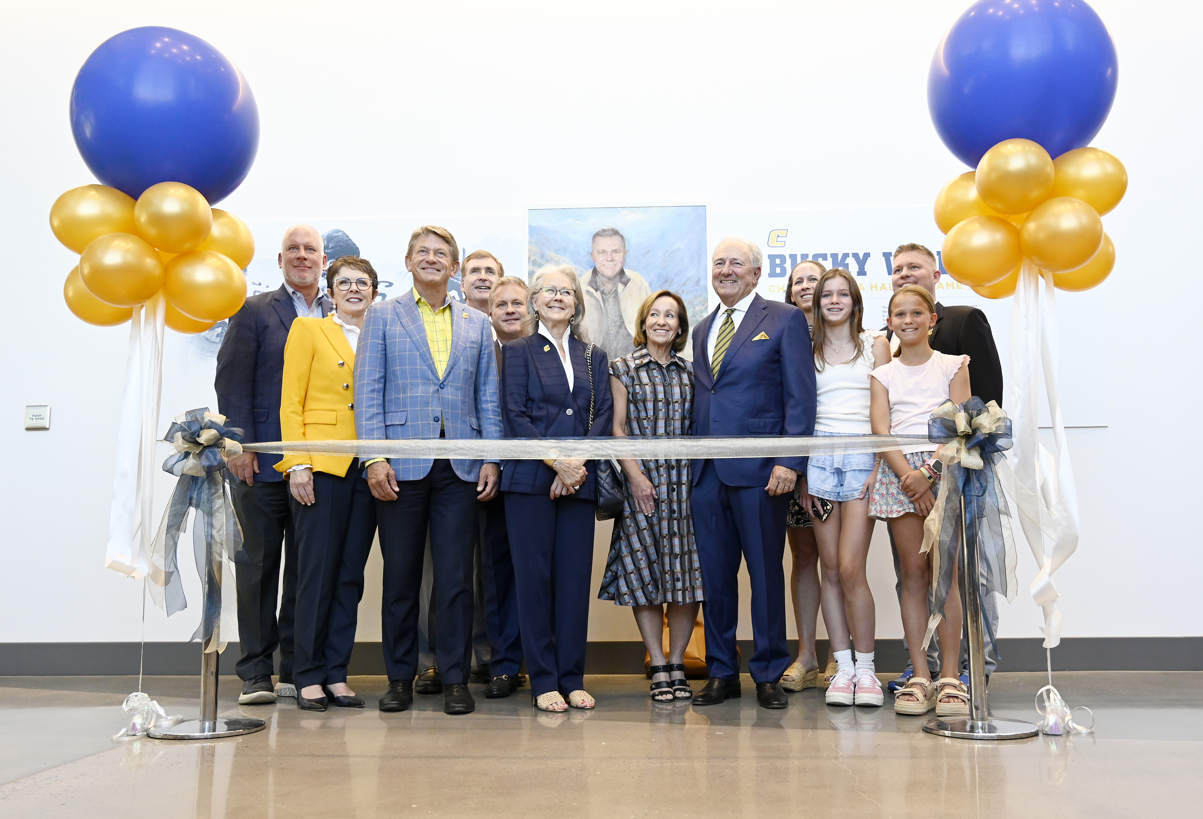 Staff photo by Abby White / The Wolford family and University of Tennessee leadership pose for a photo prior to the ribbon cutting ceremony. UTC Chancellor Steve Angle delivered his annual State of the University Address which also marked the grand opening of the Wolford Family Athletic Center on Monday, September 16, 2024.