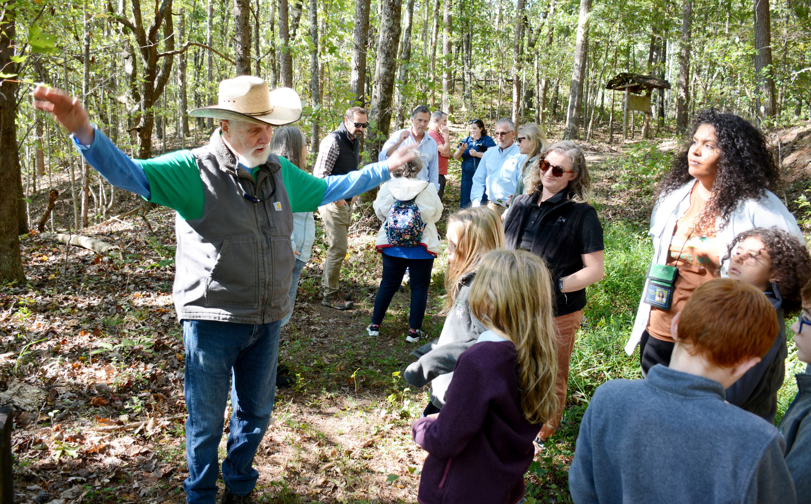 Staff Photo by Robin Rudd / On Oct. 8, 2024, Chattanooga Audubon Society member Eric Burnett explains to students and staff from Skillern Elementary at Ivy Academy how raptors use air currents to migrate. Burnett was speaking atop Audubon Mountain, near Sale Creek. A land swap between the state and the Chattanooga Audubon Society will allow for portions of the Cumberland Trail to connect through an undeveloped portion of McDonald Farm.