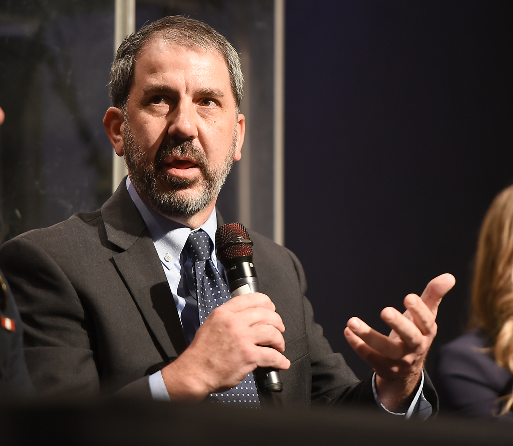 Staff photo by Matt Hamilton / Hamilton County Superintendent Justin Robertson speaks during a gun violence summit at Brainerd Crossroads on Tuesday, Oct. 8, 2024.