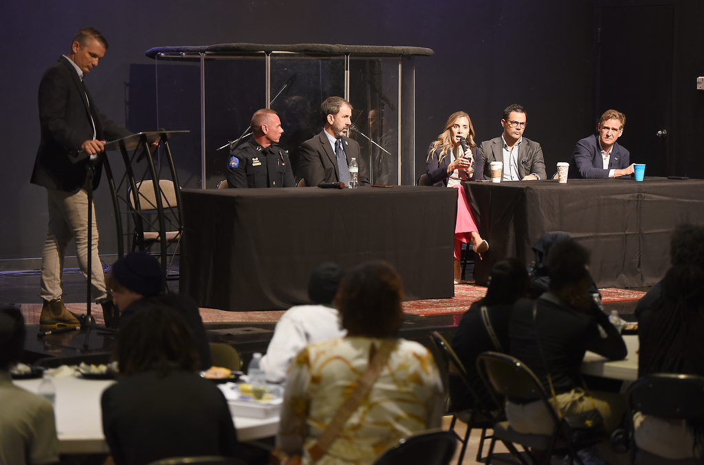 Staff photo by Matt Hamilton / Jonathan Ingraham, left, leads a panel discussion with, from left, Chattanooga Police Chief Jonathan Chambers, Hamilton County Superintendent Justin Robertson, District Attorney Coty Wamp, Hamilton County Mayor Weston Wamp and Chattanooga Mayor Tim Kelly on Tuesday, Oct. 8, 2024.