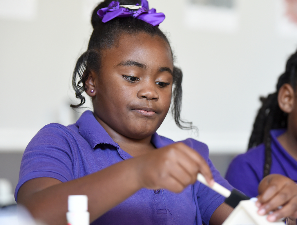 Staff photo by Matt Hamilton/ Rylee Williams paints a birdhouse Oct. 22, 2024, at Girls Inc. of Chattanooga.