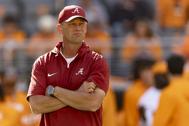 AP photo by Wade Payne / Alabama football coach Kalen DeBoer watches as his team warms up before last Saturday's game against Tennessee in Knoxville.