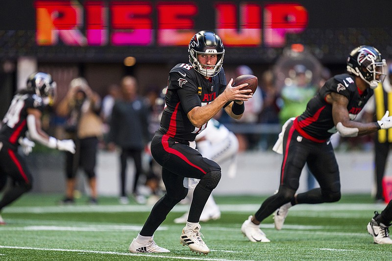 AP photo by Danny Karnik / Atlanta Falcons quarterback Kirk Cousins moves in the backfield during last week's home loss to the Seattle Seahawks.