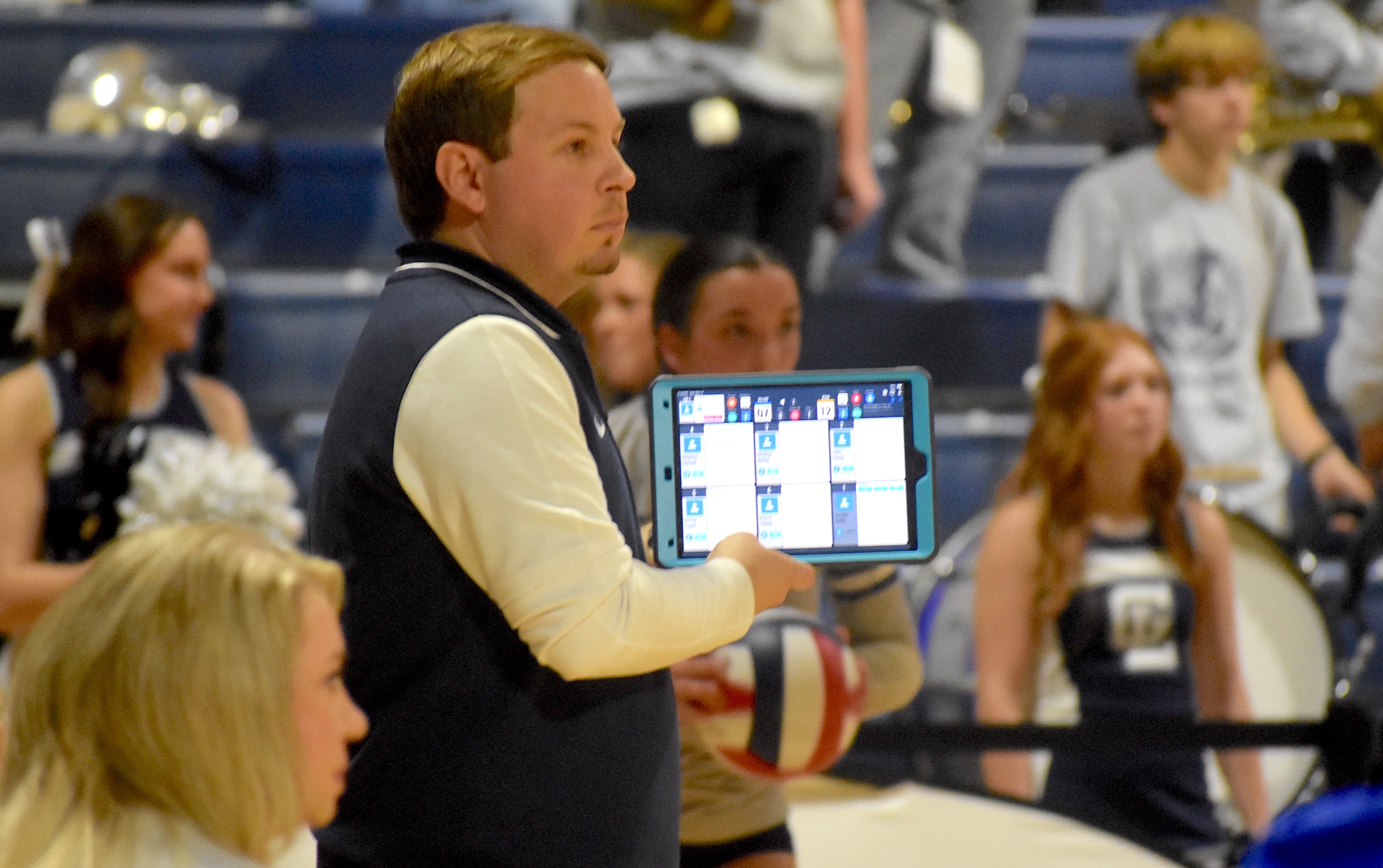 Staff photo by Patrick MacCoon / Gordon Lee volleyball coach Nic Hann instructs his team's service during Monday's GHSA Class A state championship game against Elite Scholars Academy at LakePoint Sports in Emerson, Ga.