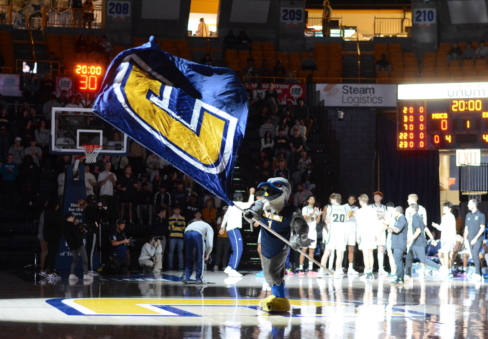 Staff Photo by Robin Rudd / Scrappy waves the power C flag as the Mocs are announced. The University of Tennessee at Chattanooga Mocs hosted the Morehead State University Eagles in a men's basketball game on November 14, 2024.