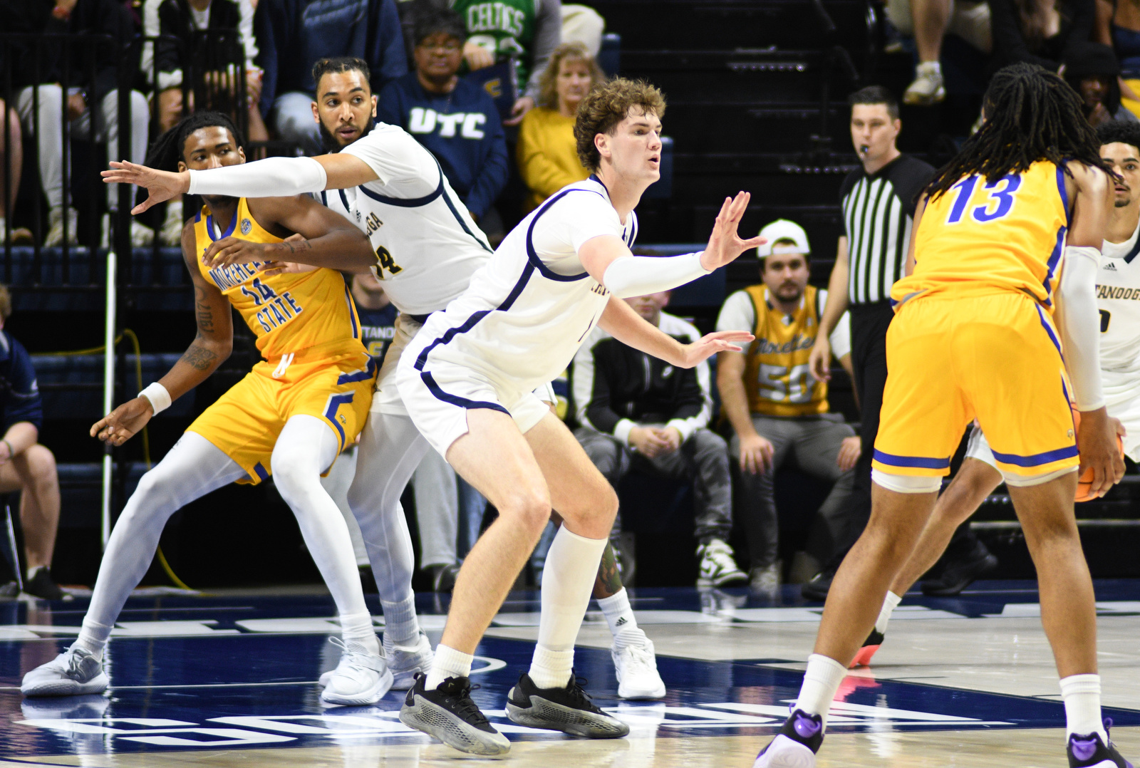 Staff Photo by Robin Rudd / Latin Diouf (23) and Sean Cusano (7) play defense for the Mocs. The University of Tennessee at Chattanooga Mocs hosted the Morehead State University Eagles in a men's basketball game on November 14, 2024.